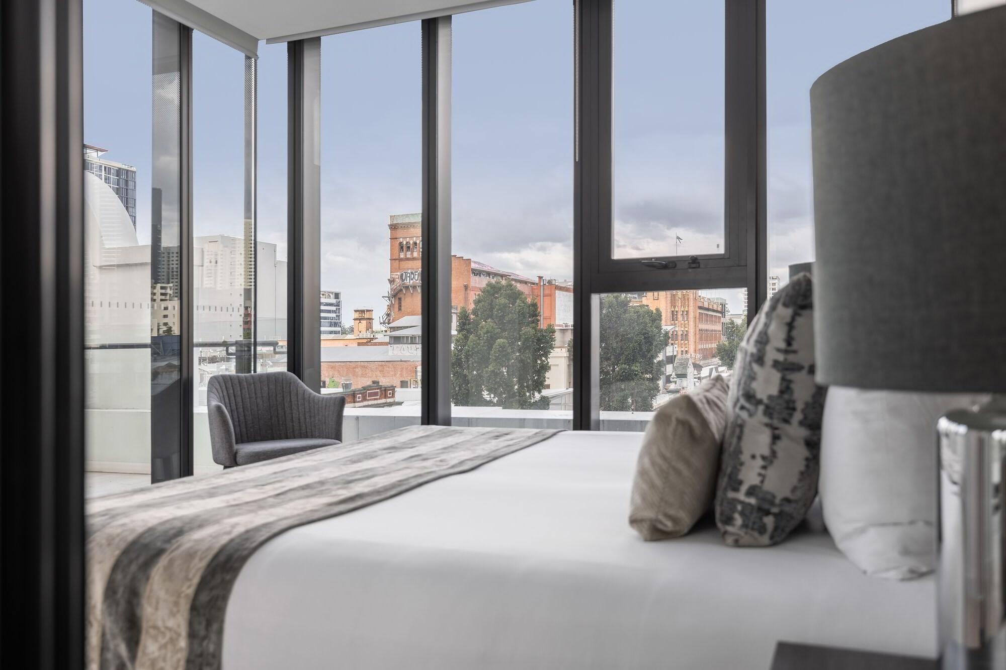 เอฟวี บริสเบน บาย เป็ปเปอร์ส Aparthotel ภายนอก รูปภาพ The bedroom of a typical apartment